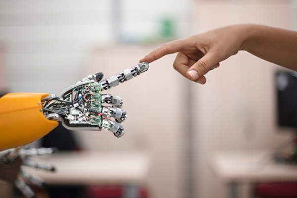 Bionic hand touching finger.