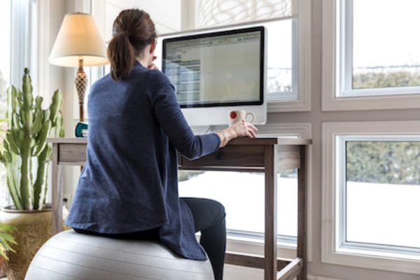 Good posture at home desk.