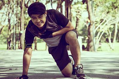 Man with chest pain on run in park.