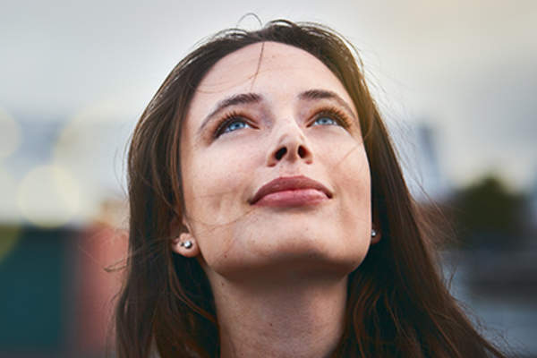 Hopeful woman with psoriasis.