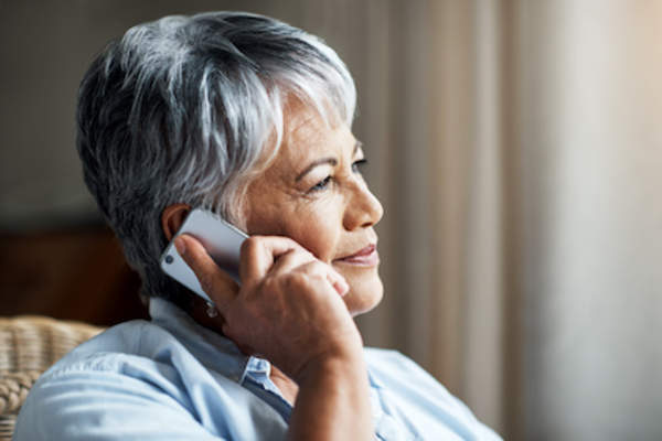Woman calling friend.