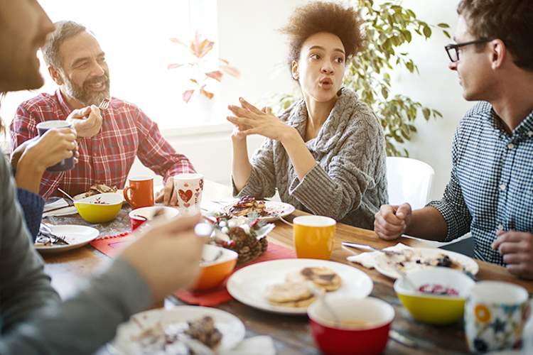 Family discussion at the breakfast table.