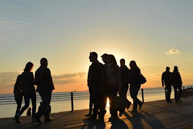 People walking on boardwalk