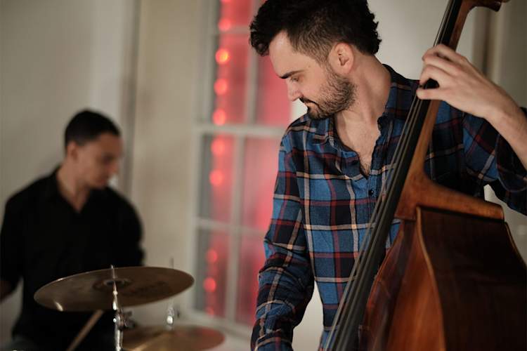 Ben Tiberio playing bass