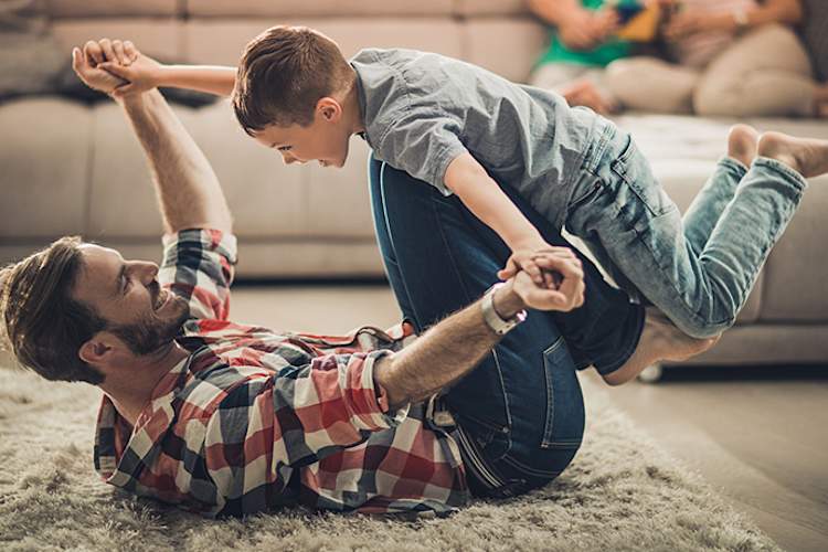 Man playing with his son could trigger a rheumatoid arthritis flare.