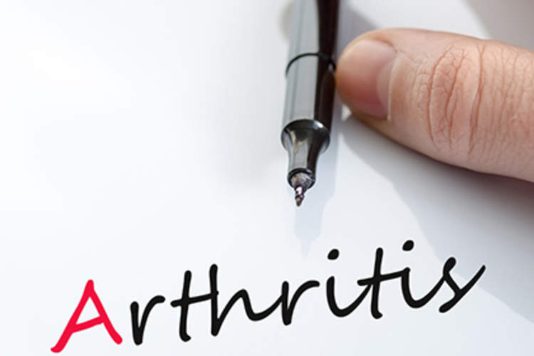 Arthritis written on a sheet of paper.