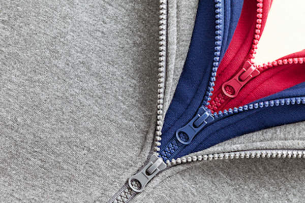 Three hoodie zippers, dress in layers concept.