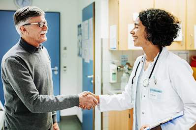 Doctor and patient shaking hands