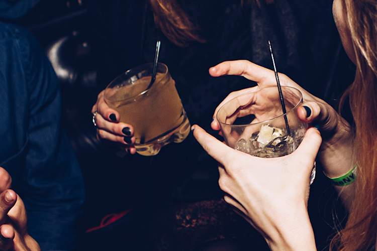 Women drinking cocktails