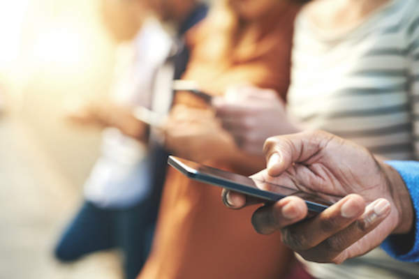 People on smartphones