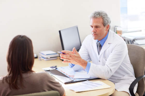 Doctor talking to patient.