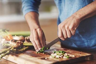Chopping vegetables.