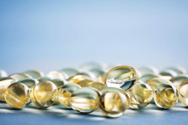 Vitamin D tablets on table.