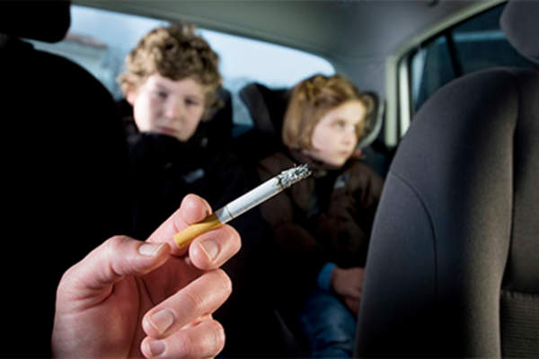 Kids riding in the car with a smoker exposed to secondhand smoke.