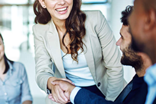 Business woman shaking hands image.