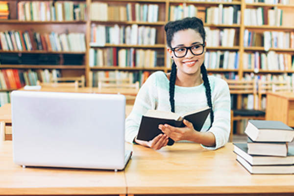 Girl getting distracted while trying to study.
