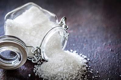 Salt spilling from shaker.