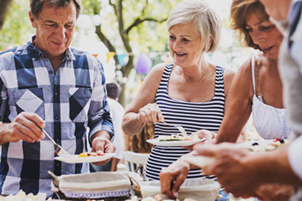 Celebrating at an outside party with family and friends.