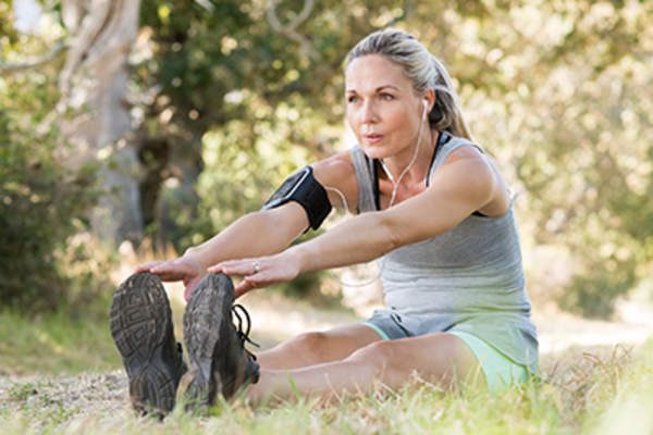 Woman stretching before a jog.