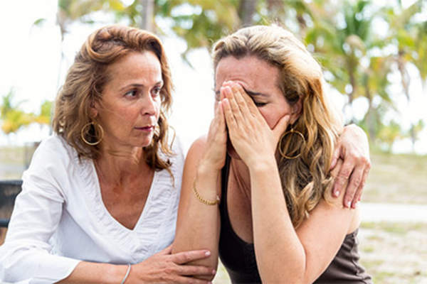 Woman comforting her partner.
