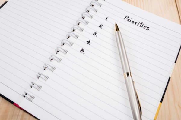 Priorities list, in note book.
