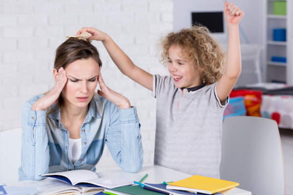 frustrated mother with ADHD child