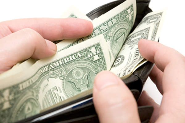 Dollar bills in wallet.