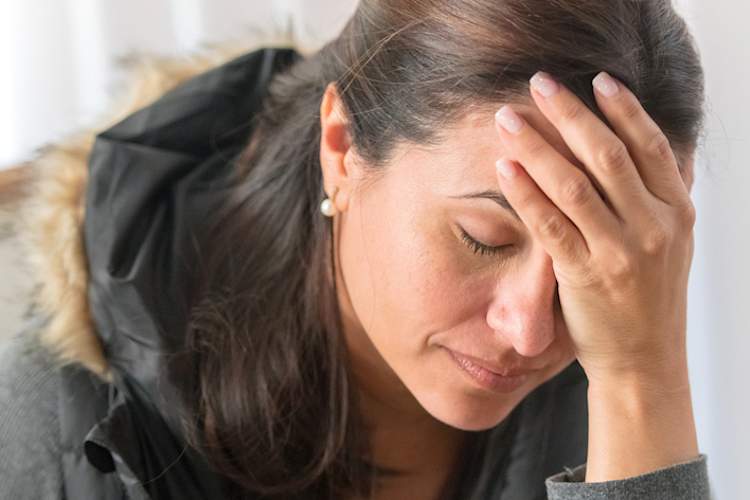 woman with severe headache