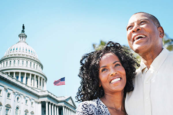 Couple in front of Capitol Hill.