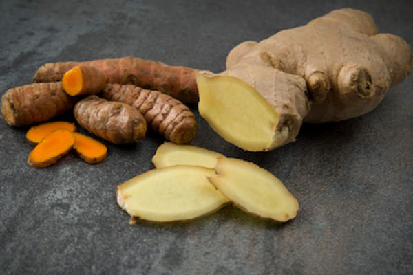 Turmeric and ginger root sliced.