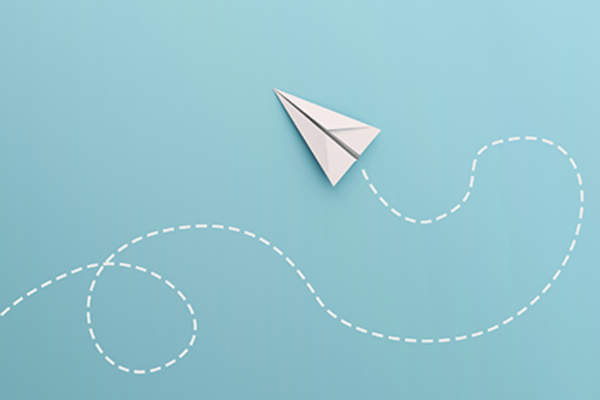 Paper airplane changing direction.