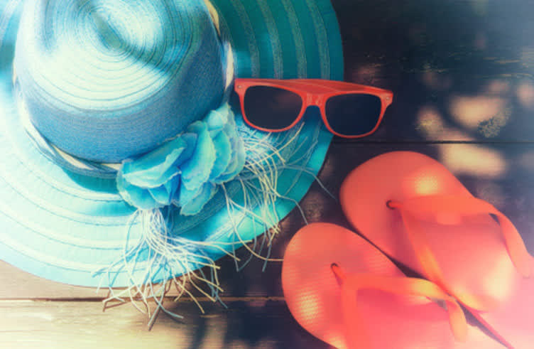 Summer hat, sunglasses and flip flops, summer concept.