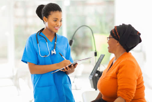woman talking to nurse