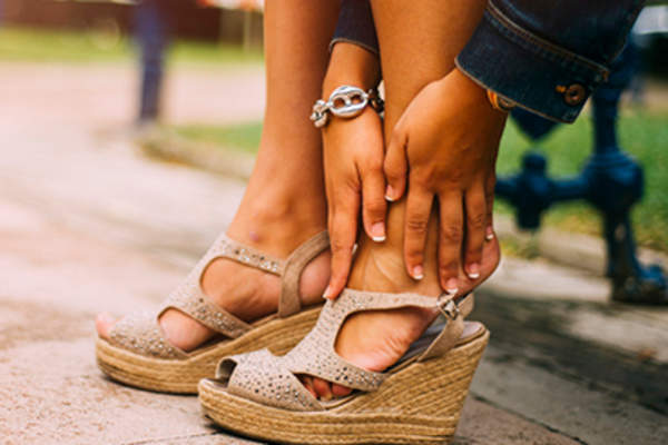 Woman with foot pain.