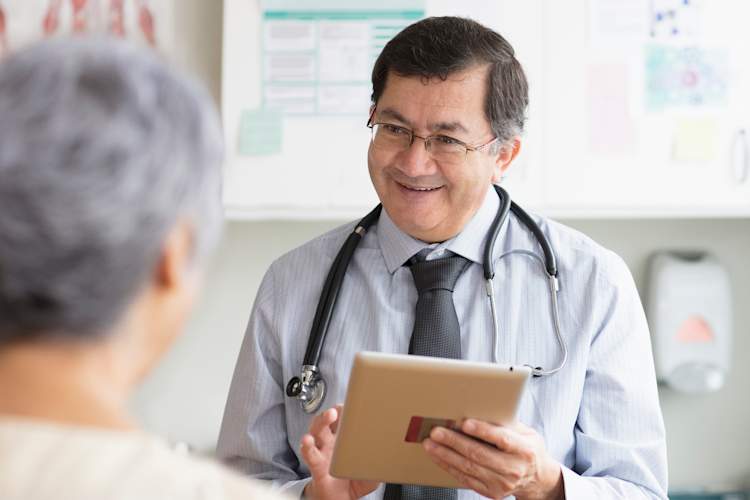 Senior patient talking to a doctor