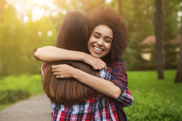 Friends hugging