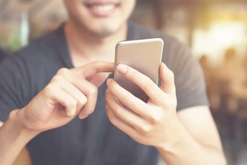 Man using his cell phone.