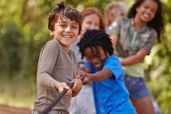 Children playing tug of war.