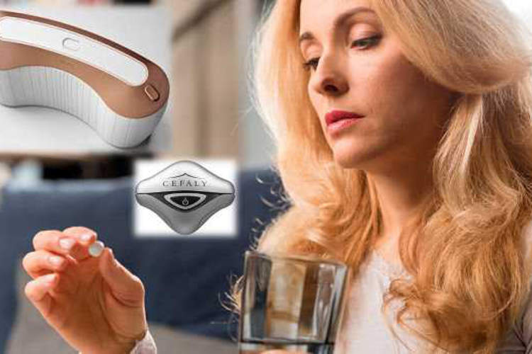 Woman about to take her medication with water.