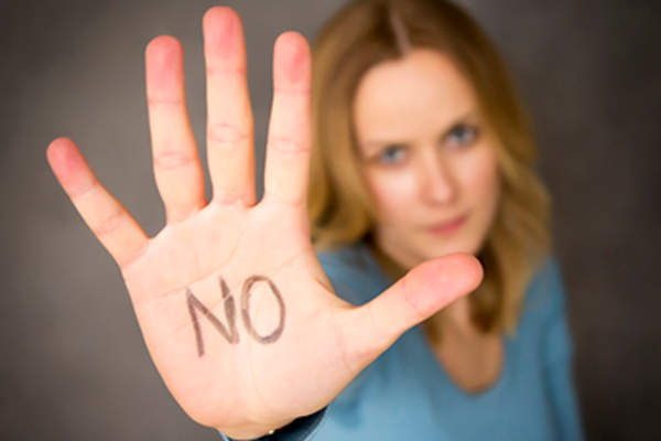 Expressing NO written on hand