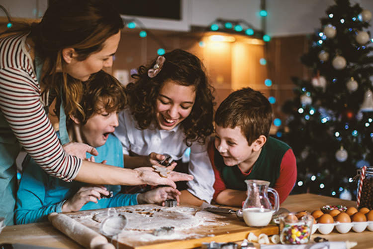 Family baking holiday cookies.