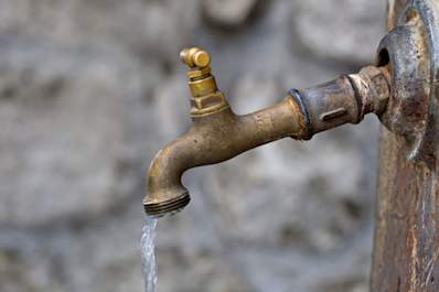Broken outdoor faucet leaking.
