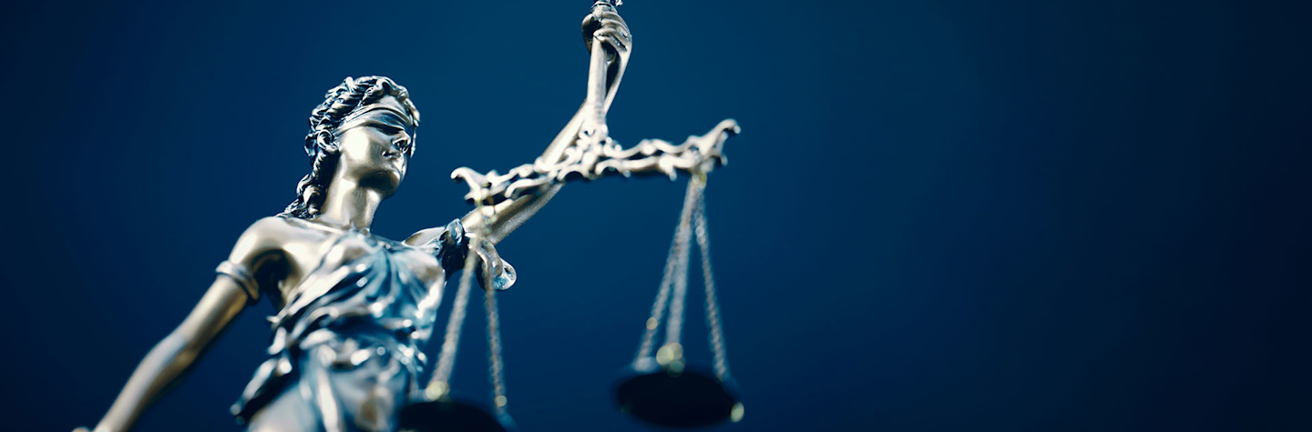 Lady Justice on dark blue background