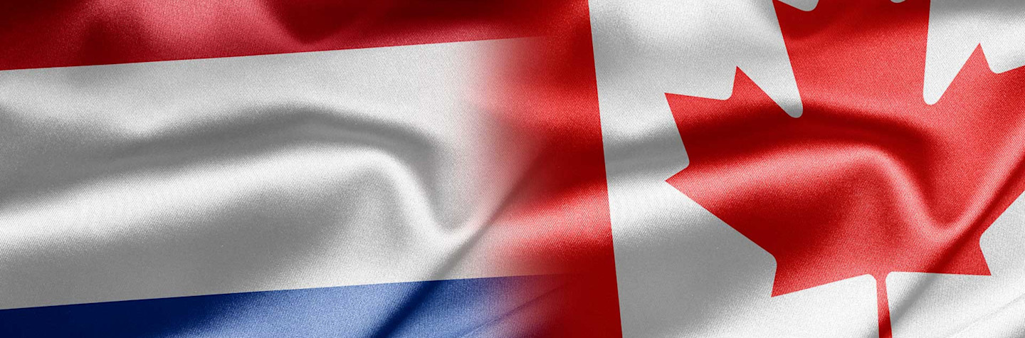 The Dutch and Canadian flags are interwoven into one flag