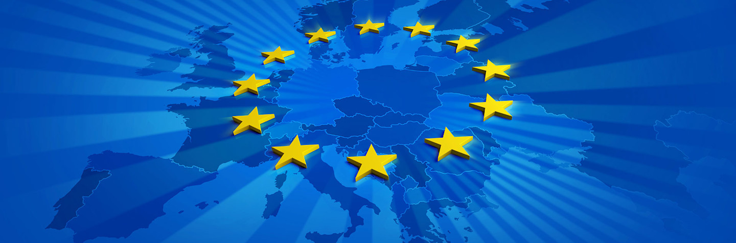 Blue colored map of the European Union with a ring of yellow stars above it