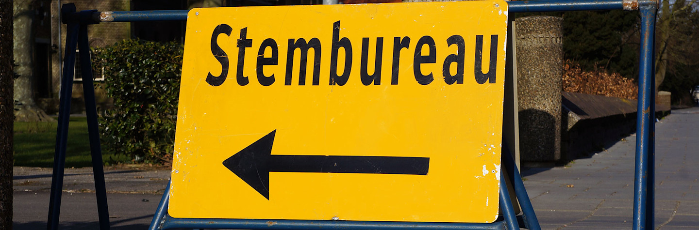 Dutch sign pointing to a voting office during elections