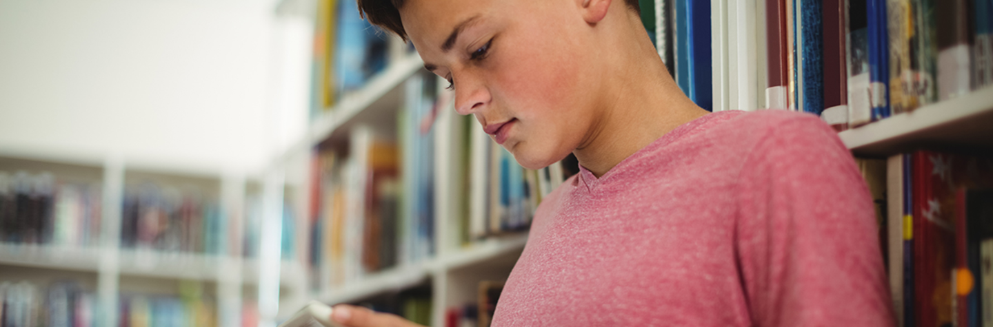 teenager at a tablet
