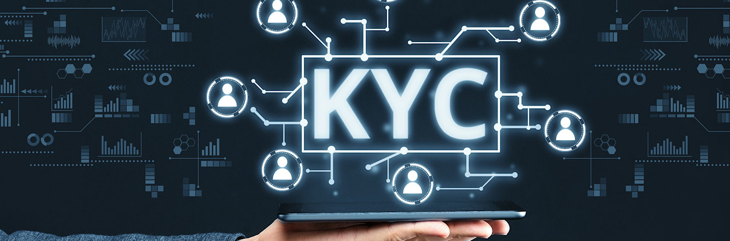 Flat hand with a tablet above which an abstract digital visualization of the Know Your Customer concept is displayed