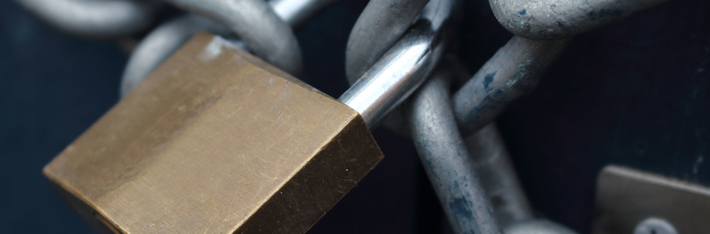 Close-up of a padlock and chain