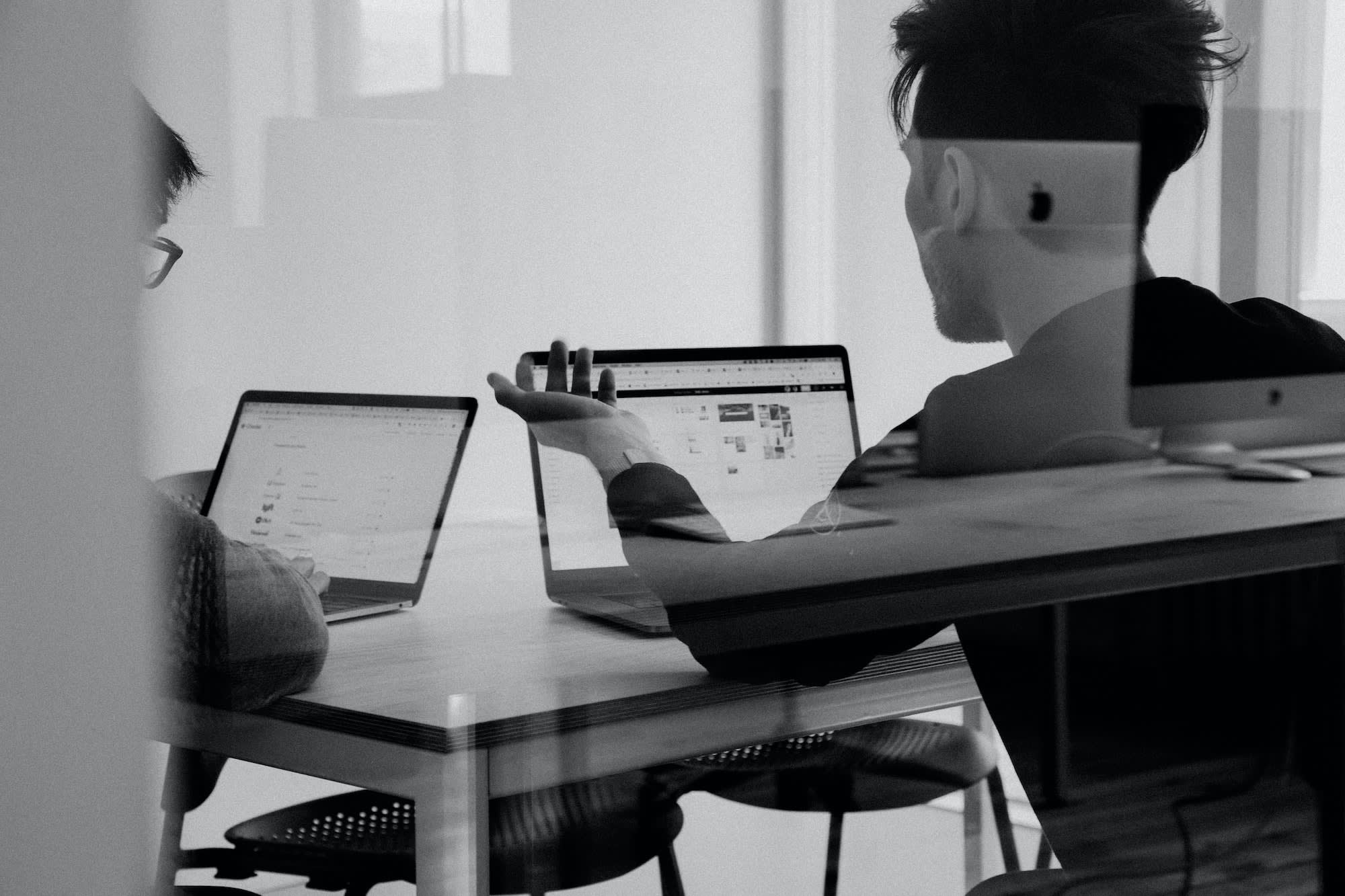 Two people at computers